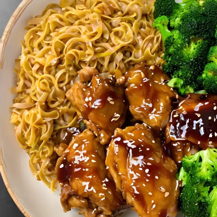 Orange Chicken Thighs with Noodles